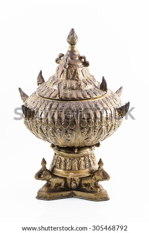 Antique brass bowl on white background