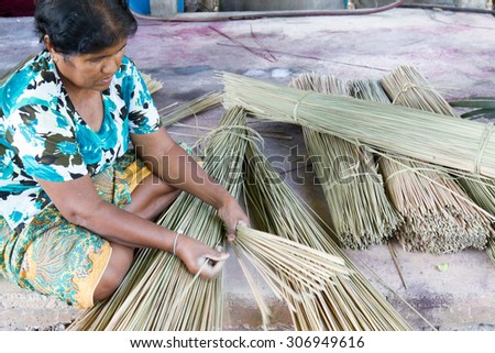 The native women is working on traditional hand made mat in Talaynoi, Phatthalung province, Thailand. Mar 24, 2015