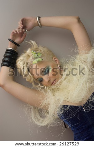 Portrait of young model with hair and makeup professionally done.