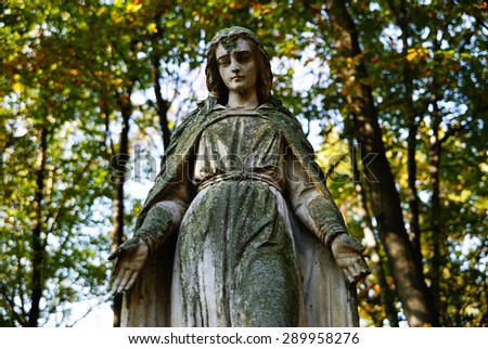 A cemetery statue of Mother Mary