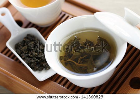 traditional chinese tea ceremony,oolong tea, gaiwan, tasting cup, bamboo tea tray