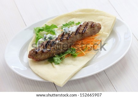 ground lamb kebab on flat bread