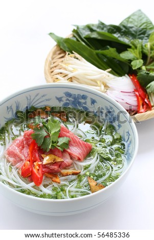 Pho bo , Vietnamese  food , Beef noodle soup with sliced rare beef