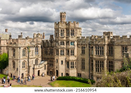 WARWICK, UK - AUGUST 5:  View of Warwick castle  on August 5, 2014 in Warwick. Warwick Castle  is a medieval castle developed from an original built by William the Conqueror in 1068.