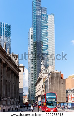 LONDON -AUGUST 6: Typical double decker bus in The City of London on August 6, 2014 in London. The City of London vies with New York City as the financial capital of the world