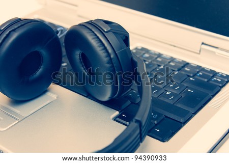 Headphones on Laptop, cross process