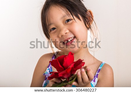 Child Holding Flower Background / Child Holding Flower / Child Holding Flower Studio Isolated Background