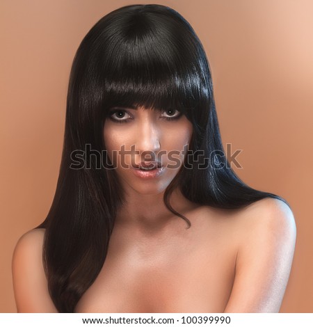 portrait of female face with long beauty glossy dark hair