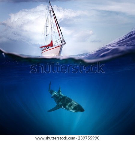 Great white shark under wave and white yacht above