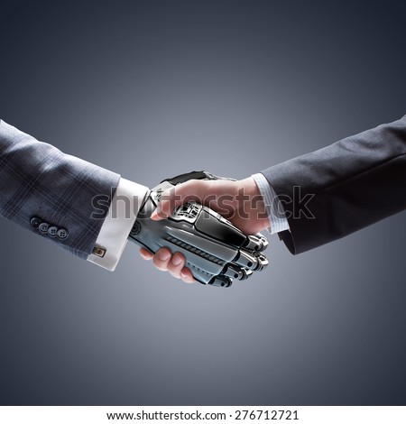 Business Human and Robot hands in handshake. Artificial intelligence technology Design Concept