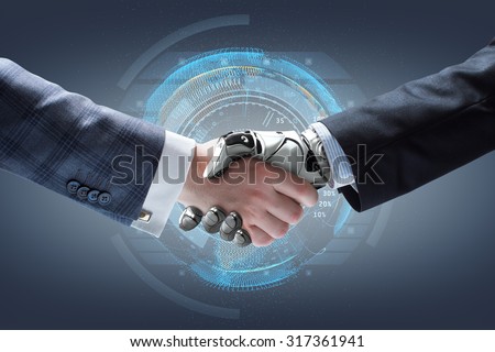 Businessman and robot\'s handshake with holographic Earth globe on background. Artificial intelligence technology