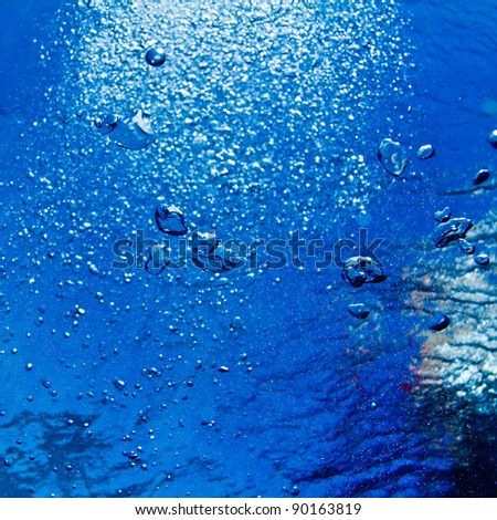 Blue underwater surface and ripples