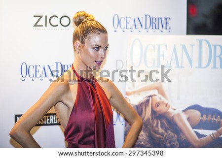 MIAMI BEACH, FL - JULY 16, 2015: Martha Hunt sings the Cover of the Magazine Ocean Drive during Miami Swim Week at the Delano Hotel on July 16th, 2015
