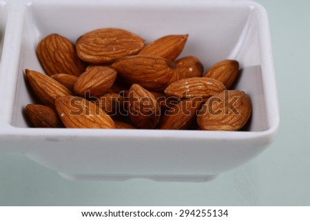 Delicious and healthy mixed dried fruit, cashews, almonds in dish