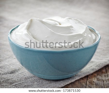 bowl of sour cream on linen napkin