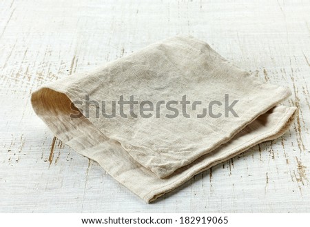 linen napkin on old wooden table