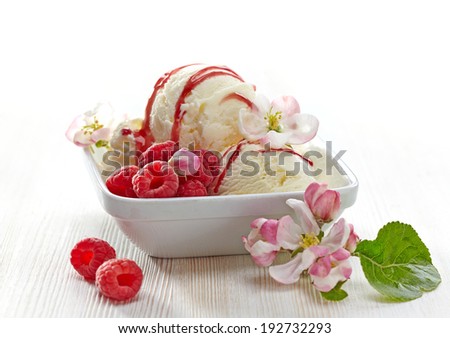 Vanilla Ice Cream with fresh berries and flowers