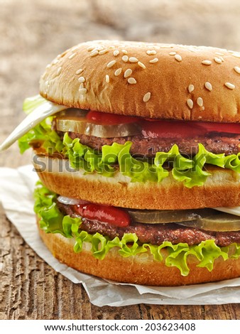 fresh big burger on a wooden table