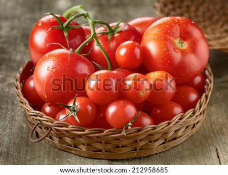 Fresh red tomatoes in a basket