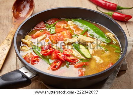 freshly cooked spicy chicken and vegetables soup