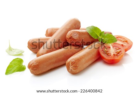 chicken sausages and tomato isolated on a white background