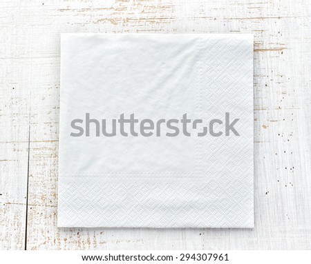 white paper napkin on wooden table