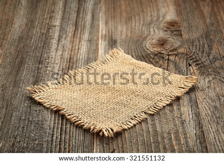 burlap napkin on old wooden table