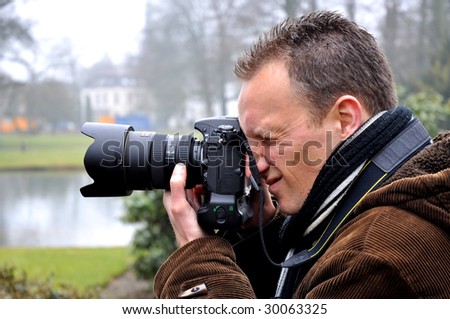 Professional photographer taking a test shot