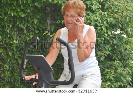 Senior woman exercising and talking to family