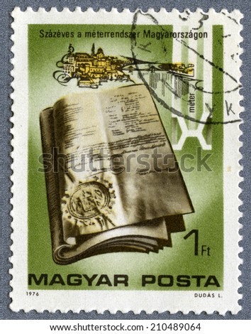 HUNGARY - CIRCA 1976: The stamp printed by Hungary shows an age-old document