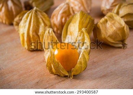 Phys alis, or Cape Gooseberry fruit  on the wooden background