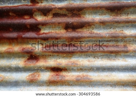 Old rusted corrugated zinc sheet roof background