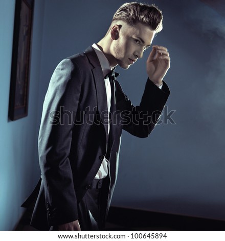 Handsome man wearing suit - stock photo