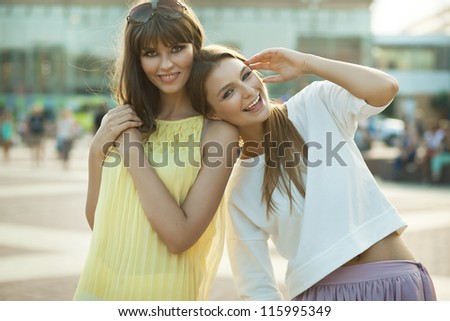 two happy females laugh and have good time together two happy females laugh and have good time together