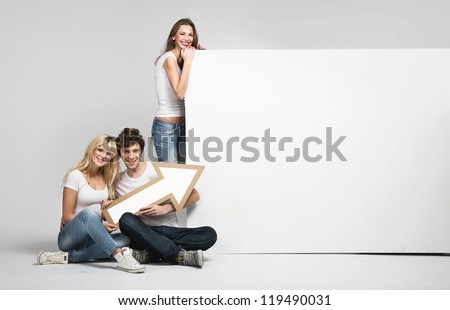 Young people with white advert