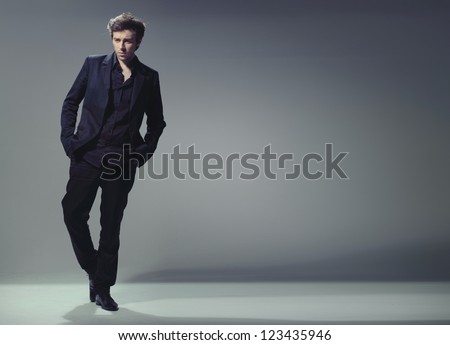 full length trendy elegant young man