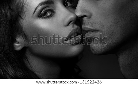 Close up black and white portrait of a loving couple