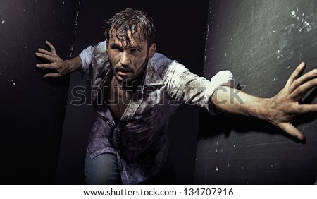 Man wearing dirty clothes