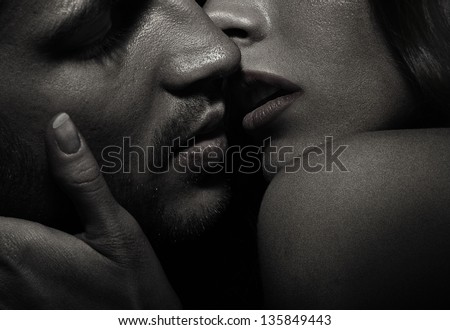 Close up portrait of a kissing couple