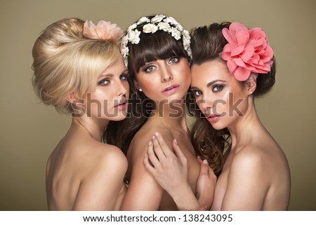 Beautiful women with flower in hair Beautiful women with flower in hair
