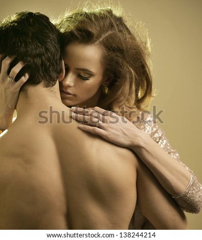 Portrait of romantic couple touching and kissing each other