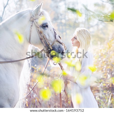 Portrait Of A Beauty Blondie With Horse