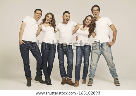 Group Of Happy Friends Presenting Advert