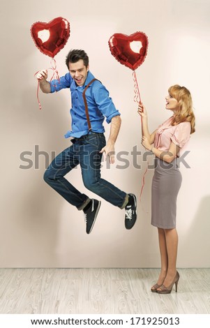 valentines couple with heart balloons valentines couple with heart balloons