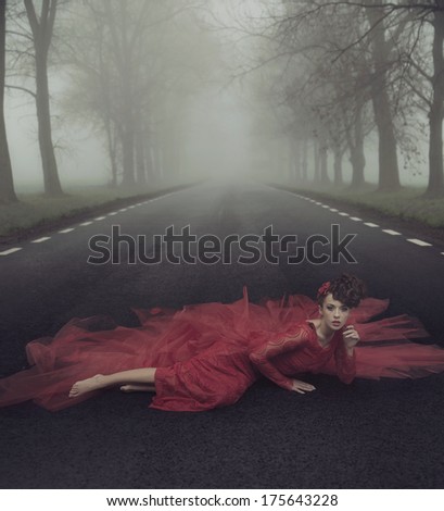 Beautiful Elegant Woman On A Country Road
