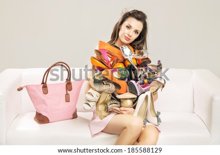 Elegant lady in a room full of fashion accessories