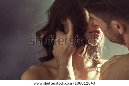 Kissing couple portrait