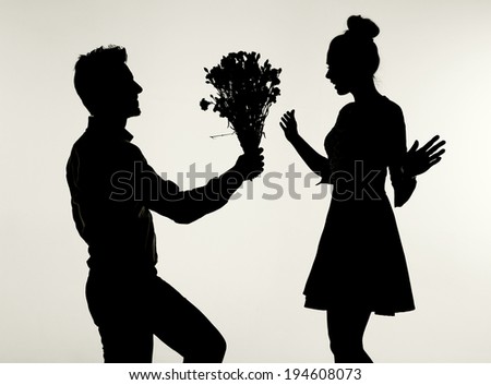 Young loving couple silhouettes