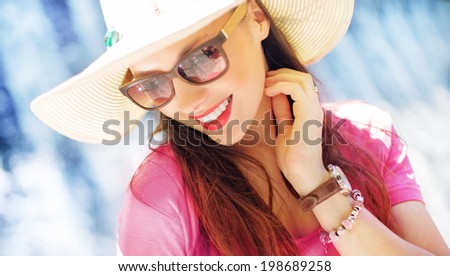 portrait of an attractive smiling woman on vacation