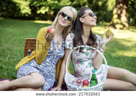 Smiling women relaxing in the park